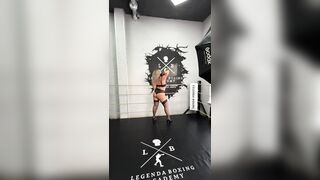 Bitch is being photographed in all poses to the music
