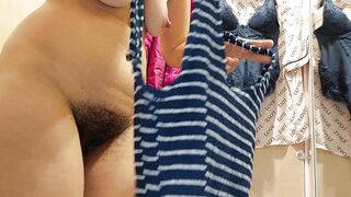 Sexy brunette in dressing room, hairy pussy, big ass, big tits.