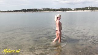 Naughty Voyeur MILF Beth Shows Off Her Hairy Pussy At The Beach