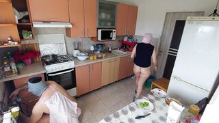Amateur couple having fun in the kitchen.