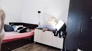 Amateur wife has fun trying on clothes and cutting them.