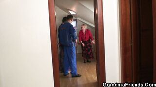 Busty blonde granny pleases two repairmen