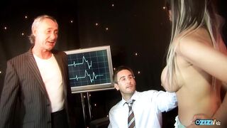 Horny nurse Katie Weale enjoys fucking with two guys at once